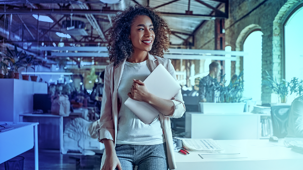 woman-leaning-on-desk-1 woman-leaning-on-desk-1
